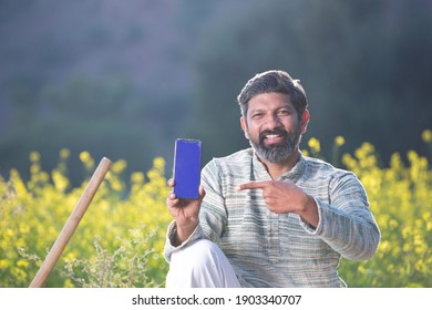 Rural Man Showing Mobile Phone