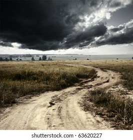 Rural road and storm clouds