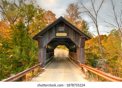 Rural Vermont Covered Bridge by the name of Gold Brook in Stowe, Vermont, USA