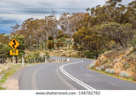 A rural winding road near Bothwell in Tasmania, Australia