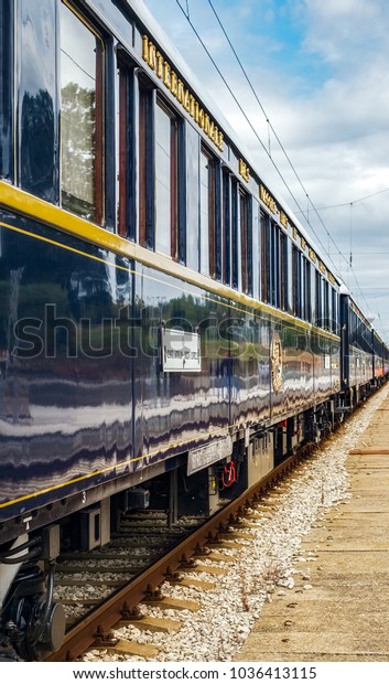 Ruse\
city, Bulgaria - August 29, 2017. The legendary Venice Simplon\
Orient Express is ready to depart from Ruse Railway station. The\
luxury train travels between Paris and\
Istanbul.