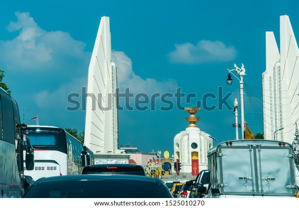 Rush hour - Cars\
stuck in traffic jam at Democracy monument Ratchadamnoen road\
Bangkok Thailand