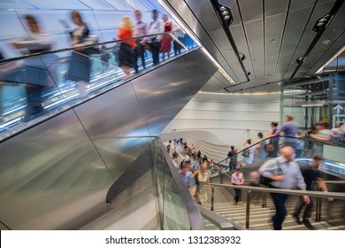 
Rush hour on modern escalator and staircase in the Wynyard Walk tunnel connecting the new entrance on Clarence Street with the train station. - Shutterstock ID 1312383932