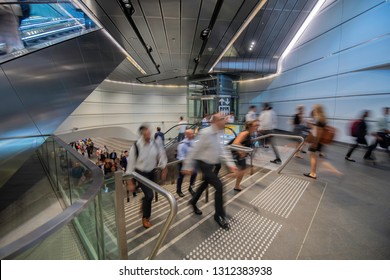 
Rush hour on modern escalator and staircase in the Wynyard Walk tunnel connecting the new entrance on Clarence Street with the train station. - Shutterstock ID 1312383938