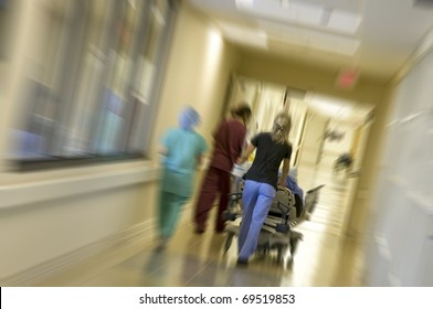 Rushing A Patient To The Emergency Room For Surgery With Motion