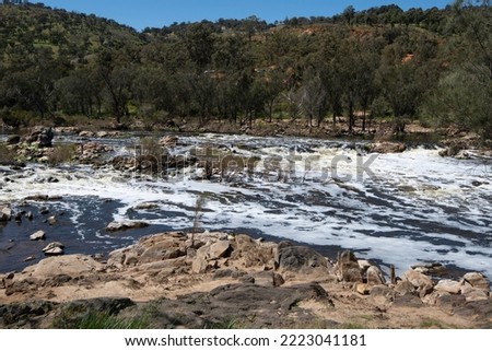 Rushing white water at Bell's Rapids on the confluence of the Swan and Avon Rivers near Baskerville, Western Australia.