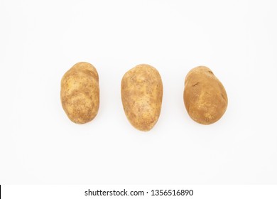 Russet Potato Arrange In A Row Isolated On White Background