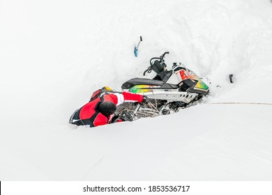 Russia, Adygea, Lago Naki Plateau, February 21, 2013: Skidoo Snowmobile Is Stuck In Deep Snow.