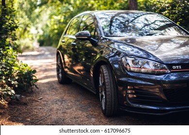 Russia - Aug 28, 2015: Volkswagen Golf GTI in a pine forest