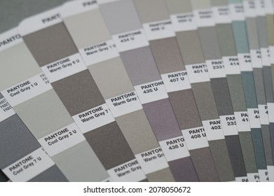 RUSSIA, BERDSK - 2021: PANTONE. Samples Of Shades Of The Pantone Color System For Printing And Publishing Houses. Selective Focus