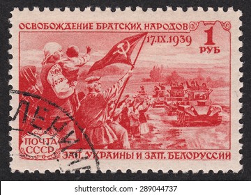 RUSSIA - CIRCA 1940: Stamp Printed By Russia, Shows The Meeting Of A Tank Column.The Liberation Of The Fraternal Peoples Of Western Ukraine And Western Belorussia, Circa 1940