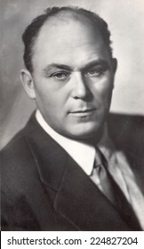 Russia, - CIRCA 1960s: An Antique Studio Portrait Of Man In A Business Suit.