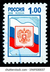 Russia - Circa 1998: Postage Stamp Printed In Malta Shows The Coat Of Arms Of Russia Has Its Origins In The Former Russian Empire, And Was Re-established After The Dissolution Of The Soviet Union