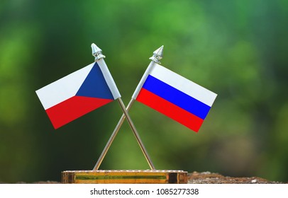 Russia And Czech Republic Small Flag With Blur Green Background