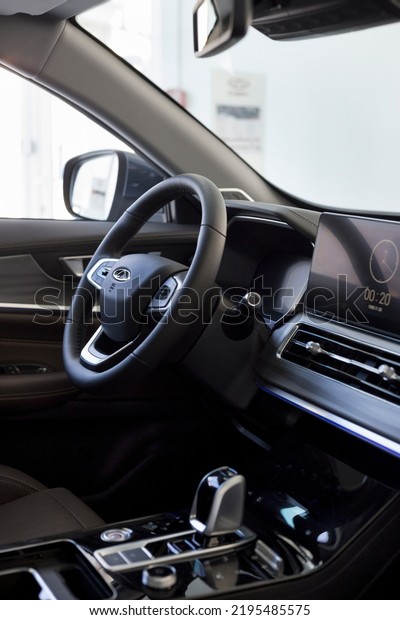Russia, Izhevsk -\
August 19, 2021: Chery showroom. Interior of new modern Chery Tiggo\
8 Pro car with automatic transmission. Car manufacturer from China.\
Modern transportation.