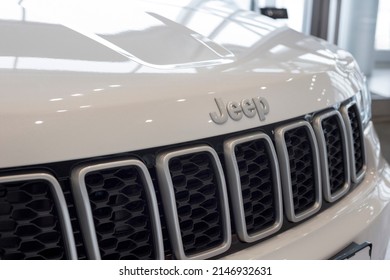 Russia, Izhevsk - March 4, 2022: Jeep Showroom. Jeep Logo On A Bumper Of New Grand Cherokee. Alliance Stellantis. Modern Transportation. Famous World Brand.