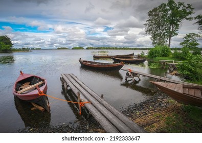 Russia, Karelia, Kizhi Island. Boats On The Shore Of Lake Onega
