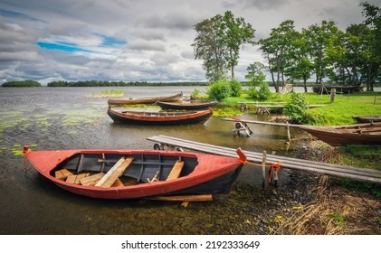 Russia, Karelia, Kizhi Island. Boats On The Shore Of Lake Onega
