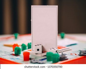 Russia, Kazan - April 3, 2019: Monopoly Board Game Pieces.