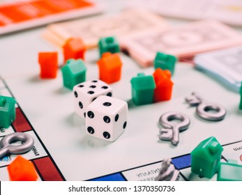 Russia, Kazan - April 3, 2019: Monopoly Board Game Pieces.