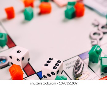 Russia, Kazan - April 3, 2019: Monopoly Board Game Pieces.