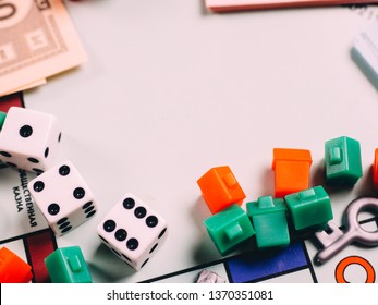 Russia, Kazan - April 3, 2019: Monopoly Board Game Pieces.