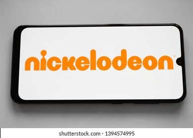 Russia, Kazan May 1 2019: Nickelodeon is an American cable and satellite television network. Nickelodeon logo on the phone screen on a white background