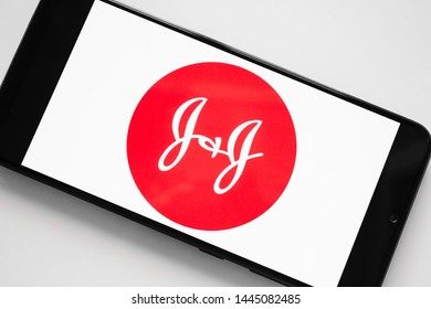 RUSSIA, KAZAN MAY 1, 2019: Johnson & Johnson logo on a white background on the smartphone screen