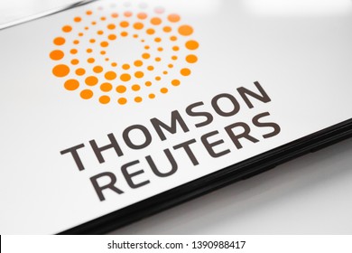 RUSSIA, KAZAN MAY 1, 2019:Thomson Reuters logo on a white background on the smartphone screen