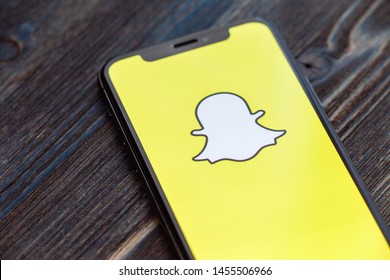 Russia, Kazan May 28 2019: Snapchat logo on iPhone X screen. Snapchat is a social media app for smartphones.