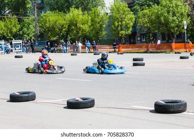 Russia, Kirov - June, 12, 2017: Car And Kart Driver During The Open Competitions In The Birthday Of City Kirov