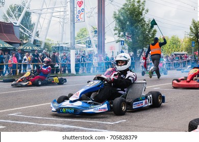 Russia, Kirov - June, 12, 2017: Car And Kart Driver During The Open Competitions In The Birthday Of City Kirov