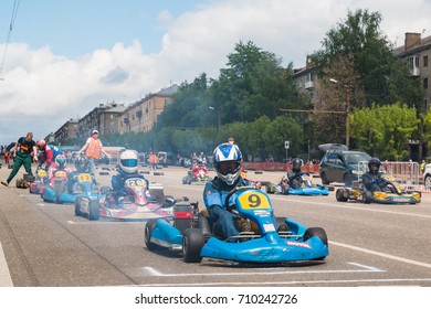 Russia, Kirov - June, 12, 2017: Car And Kart Driver During The Open Competitions In The Birthday Of City Kirov