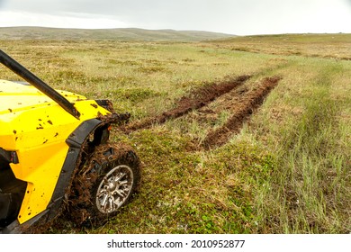 Russia, Kola Peninsula, June 21, 2013: BRO CanAm Traxter Buggy Crossing A Mud Track.