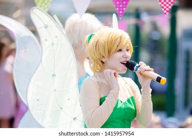 RUSSIA, KRASNODAR - MAY 31 2019: Animator Works At The Birthday Party For Little Children. Show With An Animator, Dressed In Tinker Bell Fairy Costume