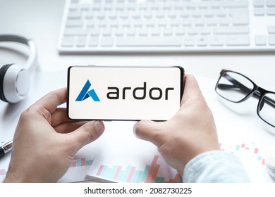 Russia Moscow 08.06.2021 Logo of Ardor in mobile phone. ARDR token.Multichain blockchain consensus-as-a-service platform.Cryptocurrency trading blockchain decentralized exchange DEX.Digital money.