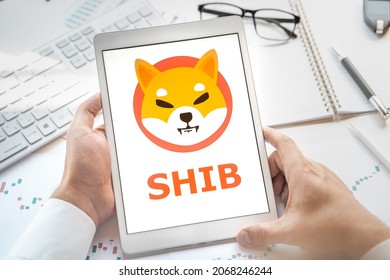 Russia Moscow 24.06.2021 Logo Of Shiba Inu In Tablet. Cryptocurrency Token SHIB. Trading Blockchain Platform To Buy,sell On Decentralized Exchange DEX. Digital Money.Business,investing.