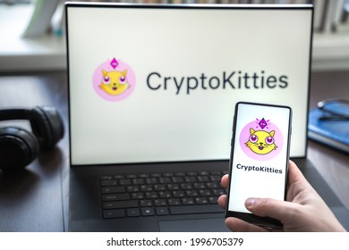 Russia Moscow 30.05.2021.Logo, Screenshot Of Blockchain Nft Ethereum Cryptocurrency Game Cryptokitties In Laptop Screen. Man Playing, Collecting Crypto Kitties. Earning Digital Money At Home.