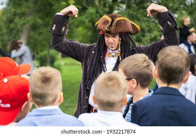 Russia Moscow 30.08.20.Back to elementary school concept.Children go to first grade. Pirate captain Jack sparrow.Party Entertainer.Graduating ceremony.Holiday,parents,teachers. Park,yard.Last day,end.