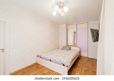 Russia, Moscow- April 24, 2020: Interior Room Apartment Modern Bright Cozy Atmosphere. General Cleaning, Home Decoration, Preparation Of House For Sale. Bedroom With Bed