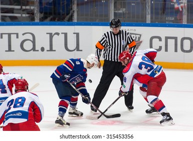 RUSSIA, MOSCOW - APRIL 27, 2015: A. Nikolishin (38) and D. Chervyakov on faceoff on hockey game CSKA vs SKA teams on Hockey Cup of Legends in Ice Palace VTB, Moscow, Russia