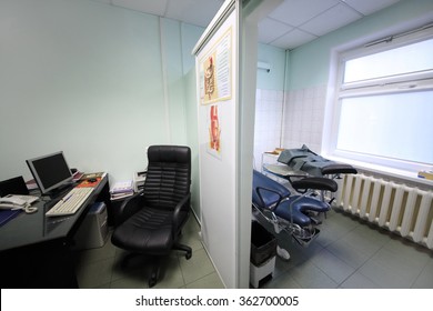 RUSSIA, MOSCOW - AUG 31, 2015: Interior Of Exam Room Gastroenterologist With Study Poster About Treatment Of Motor Disorders Of Digestive Tract On Wall Inside In Center Endosurgery And Lithotripsy