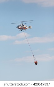 RUSSIA, MOSCOW - AUGUST 22, 2015: The Helitack Kamov 32A In The Sky On Doctrines Of Rescuers Of Ministry Of Emergency Situations Of Russia.