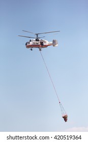 RUSSIA, MOSCOW - AUGUST 22, 2015: The Helitack Kamov 32A In The Sky On Doctrines Of Rescuers Of Ministry Of Emergency Situations Of Russia.