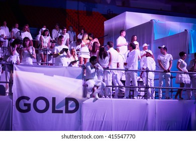 RUSSIA, MOSCOW - JUN 12, 2015: People On Gold Premium Tiered Podium In Front Of The Stage At Sensation Wicked Wonderland Show At Olympiysky Sports Complex.