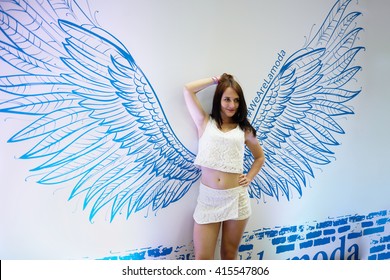 RUSSIA, MOSCOW - JUN 12, 2015: Young Woman Poses At Olympiysky Sports Complex Before Sensation Wicked Wonderland Show Begins.