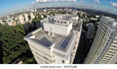 RUSSIA, MOSCOW - JUN 24, 2014: Aerial View Of Megapolis With Tall Residential Complex At Summer Sunny Day On Elk Island. Photo With Noise From Action Camera