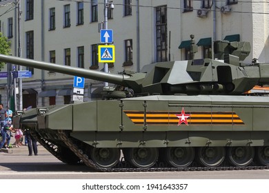 Russia, Moscow - June 24, 2020: Moscow Victory Day Parade. T-14 Armata Battle Tank Drives Down Krasnaya Presnya Street Next To The Moscow Zoo.