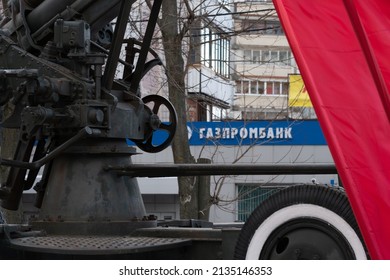 RUSSIA, MOSCOW - MAR 05, 2022: Gazprom war bank gun logo, In the afternoon city finance from corporation and bank savings, street hungarian . Banka commercial management, icon