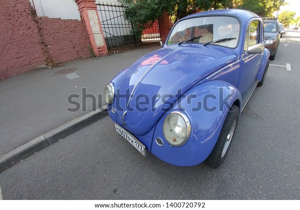 Russia, Moscow - May 04, 2019: Blue Vintage car\
Volkswagen Beetle  (Volkswagen Bug, VW Kaefer) parked on the\
street. Front side view